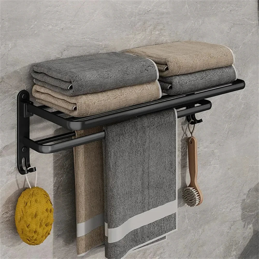 Modern zwart aluminium opvouwbaar badkamerrek, roestvrij en duurzaam. Perfect als ophangrek voor handdoeken in kleine badkamers.