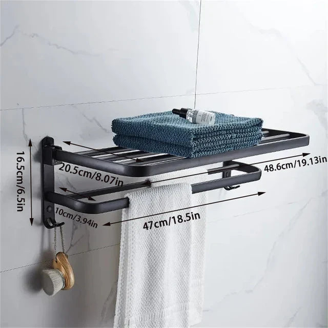Compact, opvouwbaar handdoekenrek voor badkamer en toilet. Roestvrij zwart aluminium wandrek, modern en ruimtebesparend.