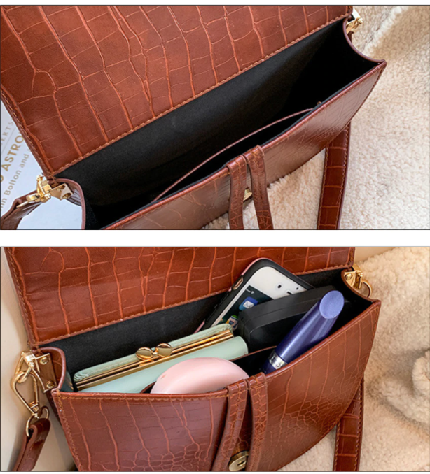 Detailfoto: Krokodillenprint op zwarte vegan leren dames crossbody tas. Duurzaam en stijlvol design.