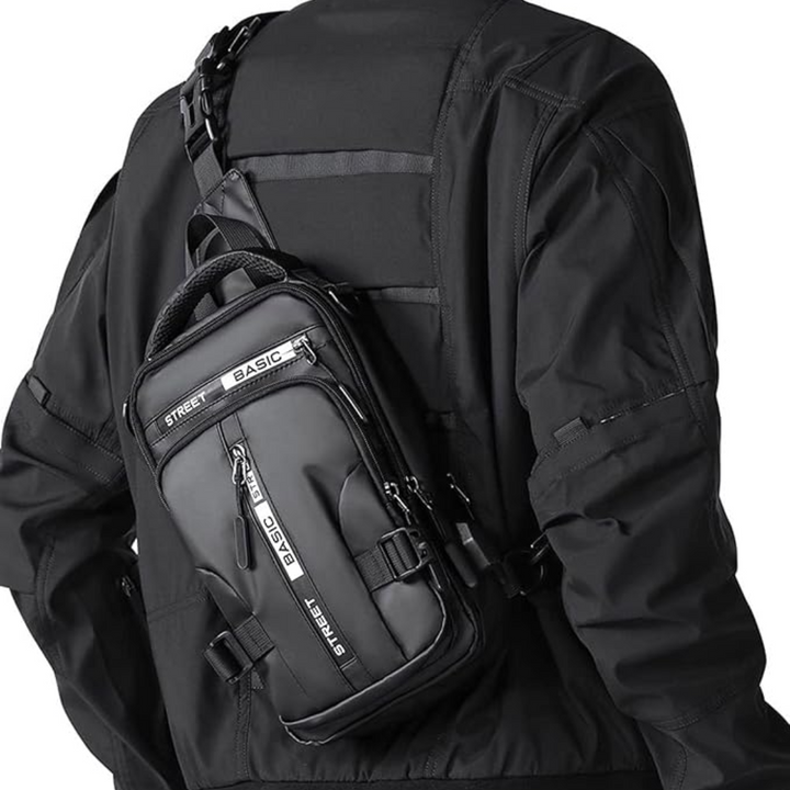 Zwarte compacte UrbanLite sling rugzak voor dagelijks gebruik, unisex en lichtgewicht.