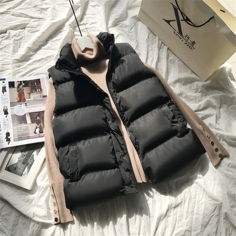 Zwarte dames bodywarmer Bo, stijlvol en warm, perfect voor lente en herfst. Comfortabele mouwloze buitenkleding.