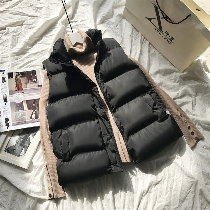 Zwarte dames bodywarmer Bo, stijlvol en warm, perfect voor lente en herfst. Comfortabele mouwloze buitenkleding.