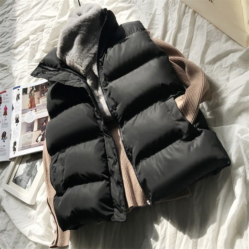 Moderne zwarte bodywarmer voor dames, ideaal als lentejas of herfstjas. Comfortabel en winddicht vest.
