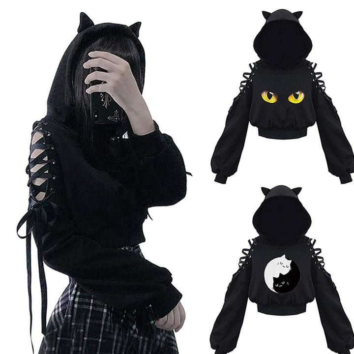 Zwarte dameshoodie met schattige kattenoren; trendy, comfortabel en speels voor casual mode.