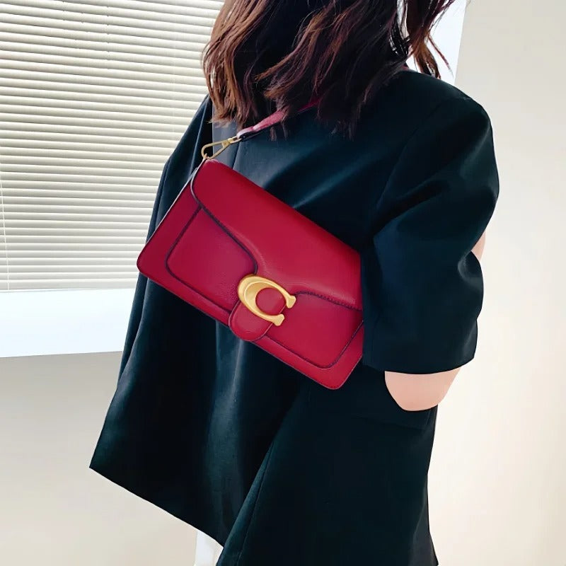 Luxe bruine handtas voor dames, een elegant accessoire voor dagelijks en georganiseerd gebruik.