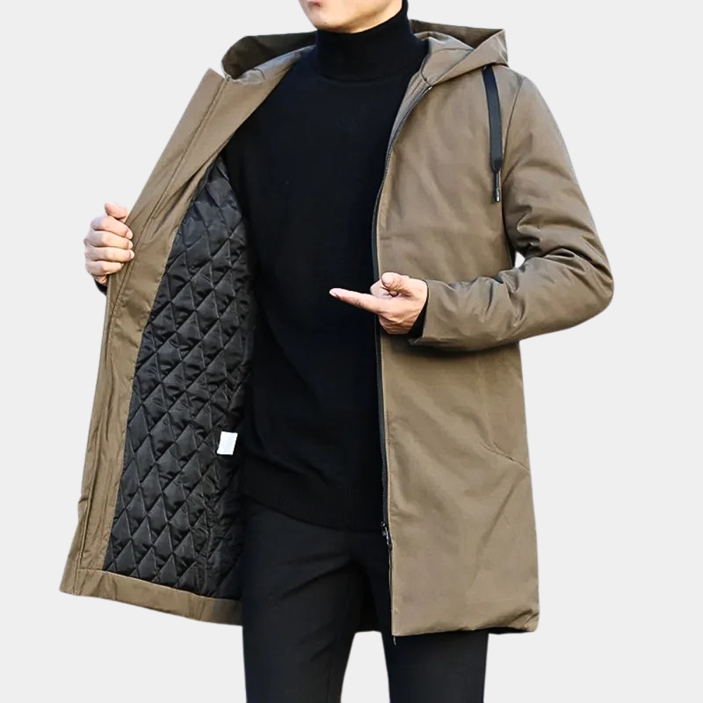 Heren longline jas met capuchon, rits en lange pasvorm. Ideaal voor zowel winter als tussenseizoen. Comfortabele herenjas.