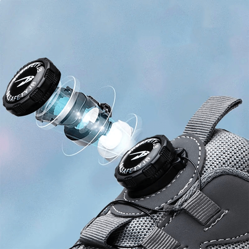 Grijze beschermende heren veiligheidsschoenen, lichtgewicht en antislip, met orthopedisch comfort voor werk.
