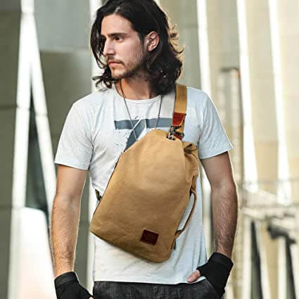 Robuuste waterdichte canvas tas met antidiefstalvak, ontworpen voor heren. Comfortabele slingtas.
