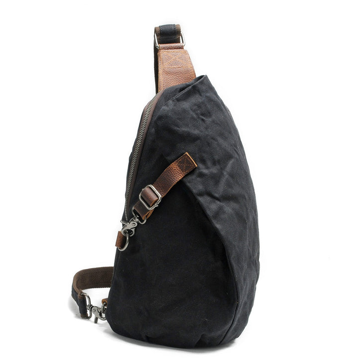 Donkergrijze heren waterdichte schoudertas van canvas. Praktische crossbodytas met antidiefstalvak, duurzaam.