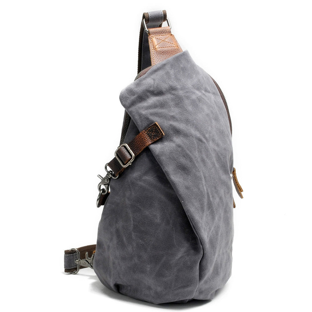 Heren MultiWear canvas tas: waterdichte crossbody met antidiefstalvak. Te dragen als schouder- of slingtas.