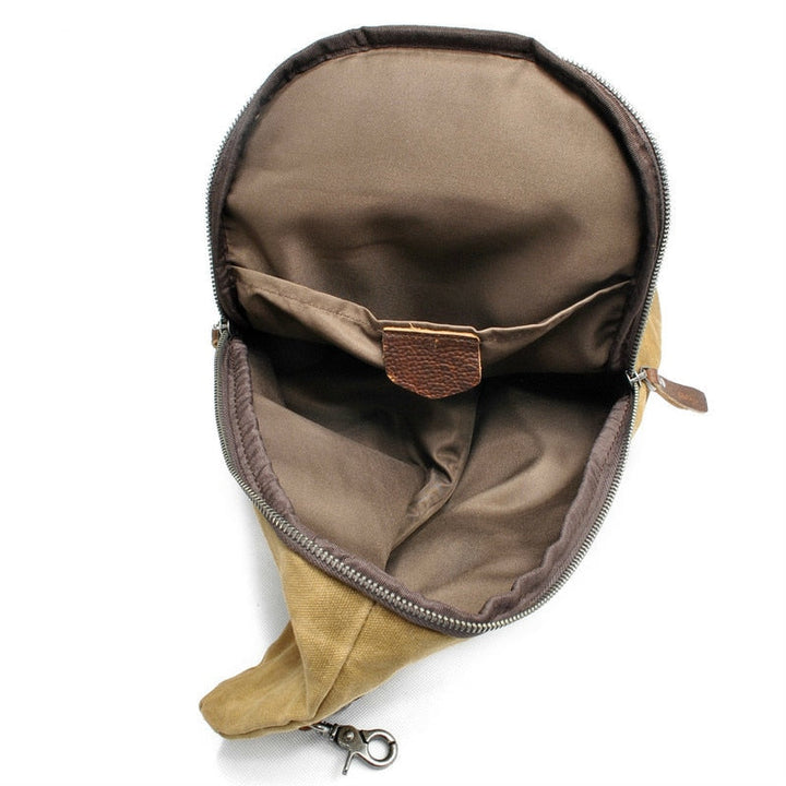 Khaki waterdichte heren crossbodytas van canvas. Veilige reistas met antidiefstalvak, zeer praktisch.