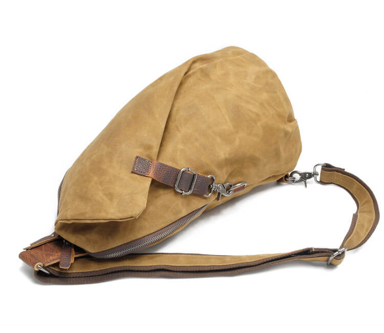 Stijlvolle zwarte heren schoudertas van waterdicht canvas. Veelzijdige crossbody met antidiefstalvak.