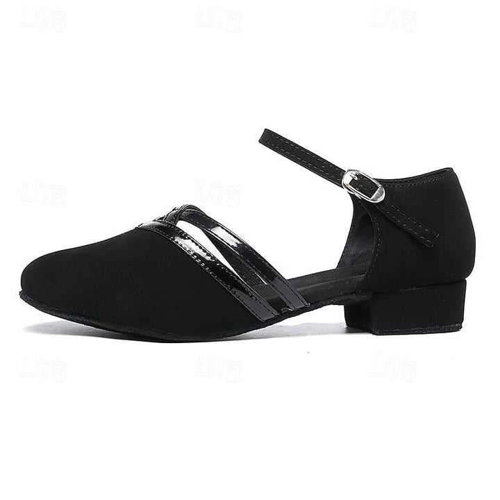 Comfortabele zwarte dames dansschoenen, flexibel en stijlvol, perfect voor modernedans en bewegingsvrijheid.