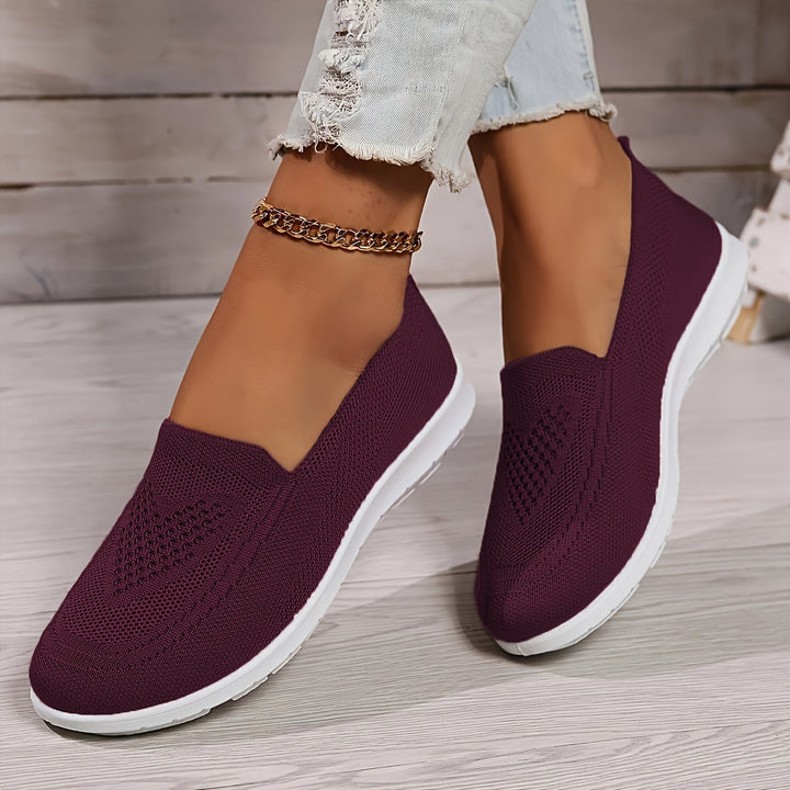 "Zwarte orthopedische dames instappers, elegant ontwerp, ademend bovenwerk, slip-on stijl, ideaal voor comfort en steun."