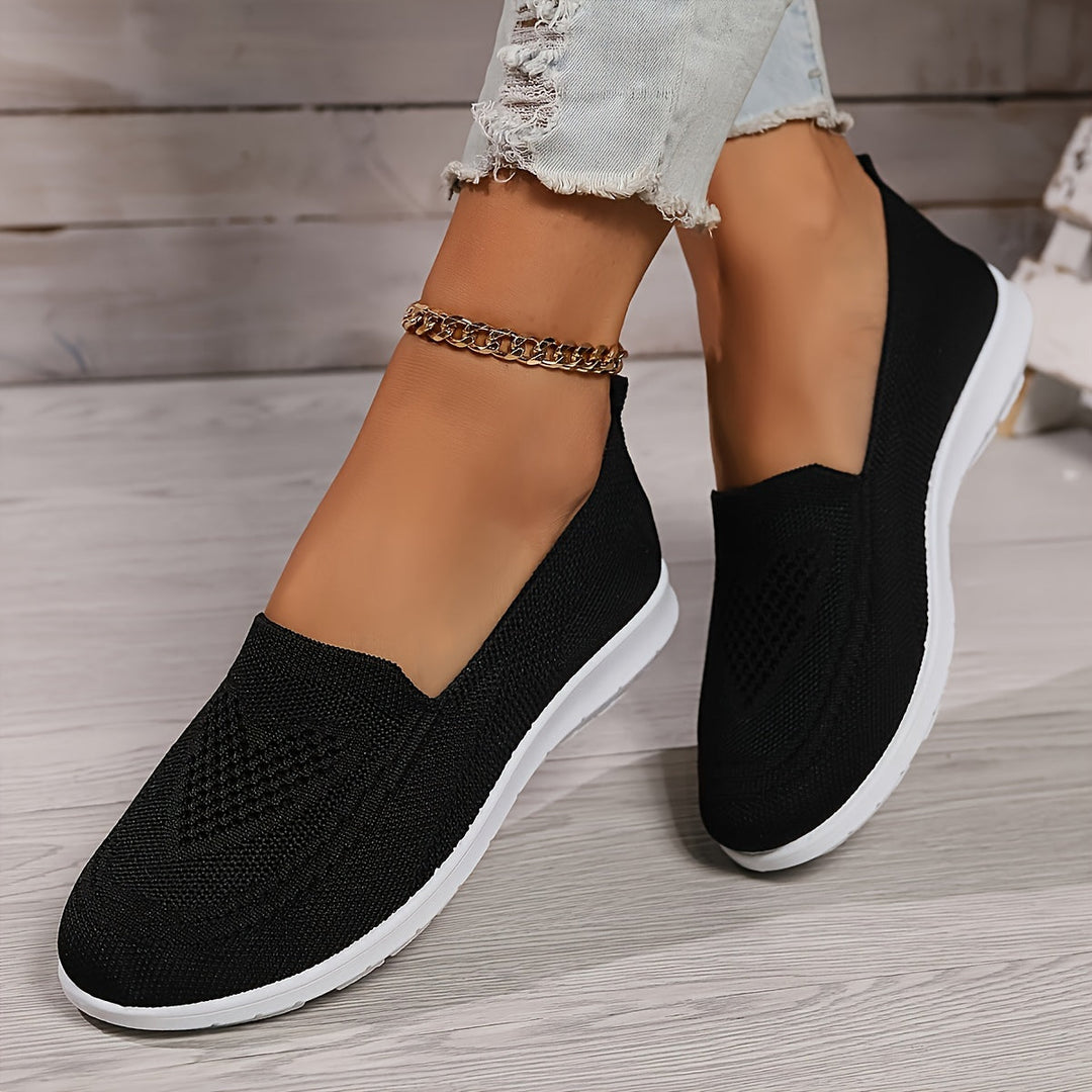 "Zwarte orthopedische dames instappers, elegant ontwerp, ademend bovenwerk, slip-on stijl, ideaal voor comfort en steun."