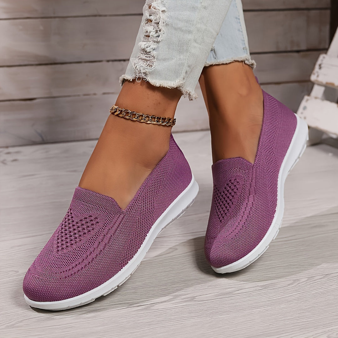 "Zwarte orthopedische dames instappers, elegant ontwerp, ademend bovenwerk, slip-on stijl, ideaal voor comfort en steun."