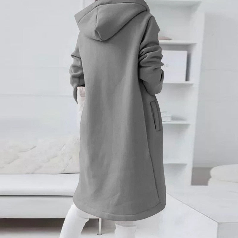 Stijlvolle en comfortabele dames middellange jas met capuchon, perfect als warme herfst- of winterjas.