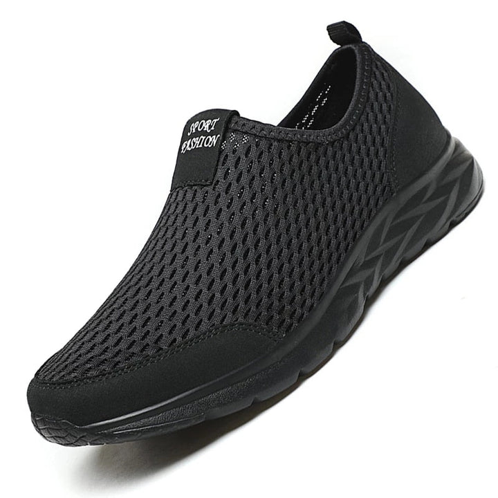 Zwarte Ualy unisex sneakers, sportief & comfortabel, perfect voor dames en heren bij dagelijks gebruik.