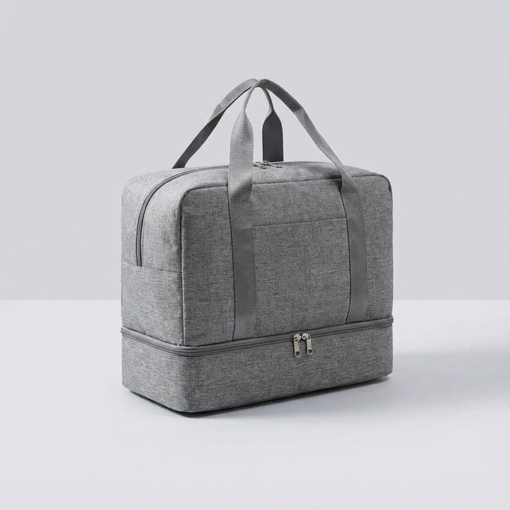 Compacte, waterdichte reistas met schoenenvak voor handbagage, perfect voor korte trips en sport.