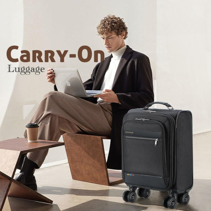Stijlvolle zwarte handbagage koffer met soepele spinner wielen, ruim uitbreidbaar hoofdcompartiment en veilig laptopvak.